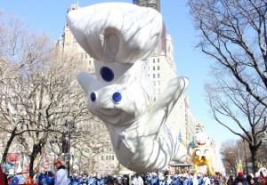 NEW YORK, NY - NOVEMBER 28: The Pillsbury Doughboy balloon floats in the 87th Annual Macy's Thanksgiving Day Parade on November 28, 2013 in New York City. (Photo by Laura Cavanaugh/Getty Images)